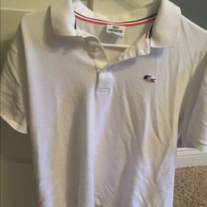 Lacoste white polo with red and blue logo